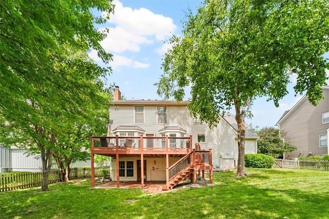 10601 Reeder St, Overland Park, KS 66214 - back of house featuring a deck, stairs, a fenced backyard, a chimney, and a patio area