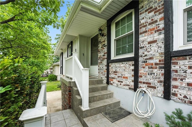 1303 SW Mission Pl, Lees Summit, MO 64081 - entrance to property with brick siding and a porch