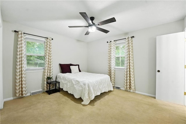 1303 SW Mission Pl, Lees Summit, MO 64081 - carpeted bedroom featuring baseboards and ceiling fan
