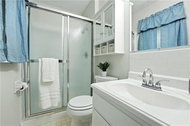 1303 SW Mission Pl, Lees Summit, MO 64081 - bathroom with a stall shower, vanity, and tasteful backsplash