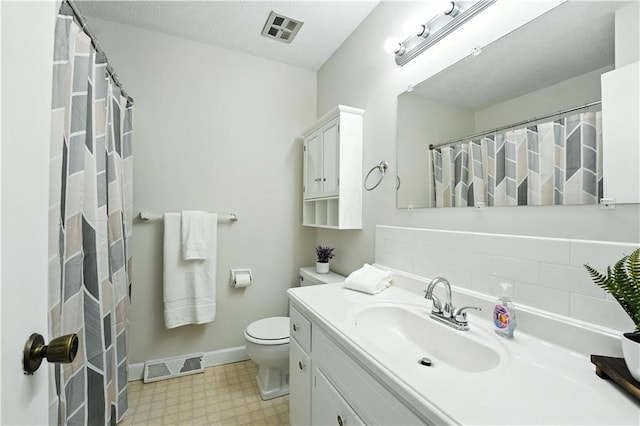 1303 SW Mission Pl, Lees Summit, MO 64081 - full bathroom with tile patterned floors, vanity, and a shower with curtain