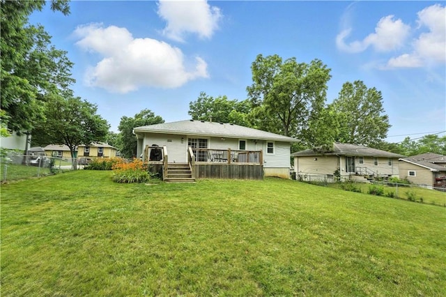 1303 SW Mission Pl, Lees Summit, MO 64081 - back of property featuring a wooden deck and a fenced backyard