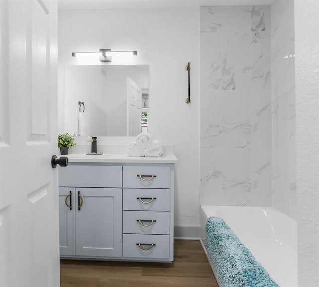 731 S Main St, Ottawa, KS 66067 - bathroom with vanity and wood finished floors