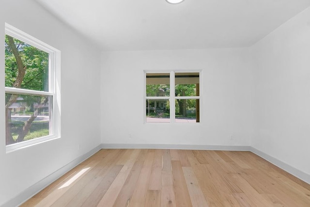 731 S Main St, Ottawa, KS 66067 - unfurnished room with healthy amount of natural light and light wood-style flooring