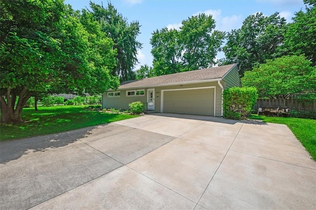 3118 10th Ave, Leavenworth, KS 66048 - single story home with an attached garage and driveway