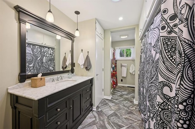 3118 10th Ave, Leavenworth, KS 66048 - bathroom with vanity and baseboards