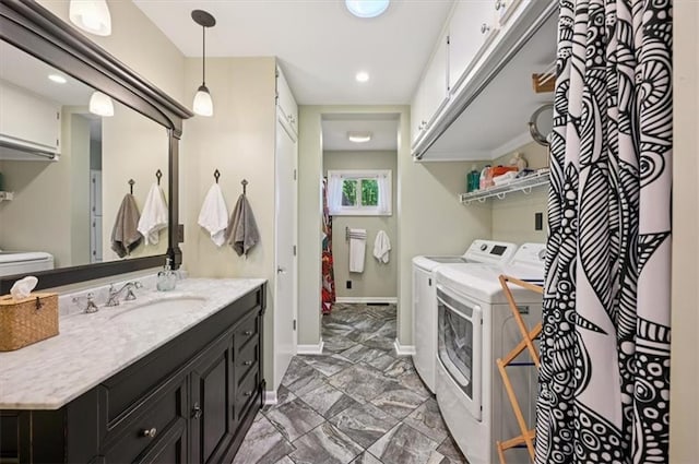 3118 10th Ave, Leavenworth, KS 66048 - washroom featuring separate washer and dryer and recessed lighting
