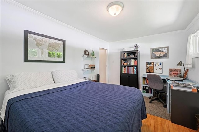 3118 10th Ave, Leavenworth, KS 66048 - bedroom with ornamental molding, light wood-type flooring, and an office area