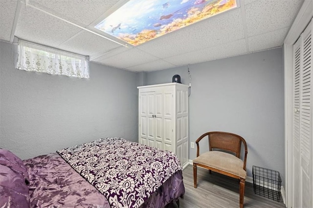 3118 10th Ave, Leavenworth, KS 66048 - bedroom with a paneled ceiling, wood finished floors, and a closet