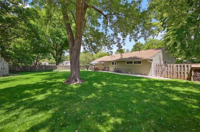 3118 10th Ave, Leavenworth, KS 66048 - fenced backyard with a patio and a storage shed