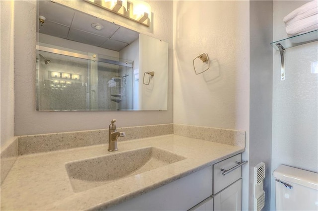 308 W 8th St Unit 420, Kansas City, MO 64105 - bathroom with vanity and a shower stall