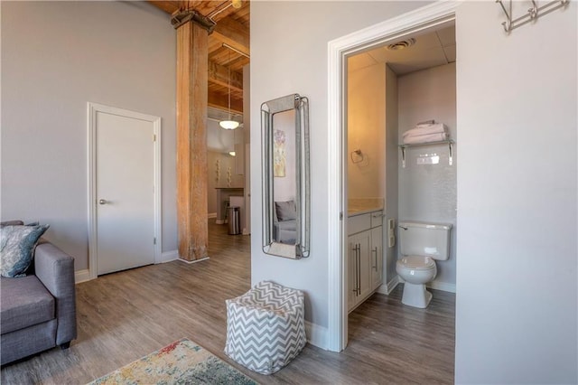 308 W 8th St Unit 420, Kansas City, MO 64105 - bathroom with wood finished floors and vanity