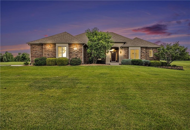 11630 S Walnut St, Olathe, KS 66061 - view of front of property featuring a front lawn and a shingled roof