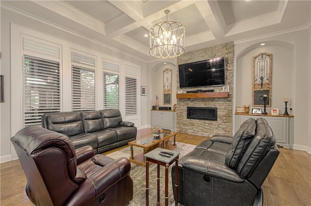 10423 W 168th Ter, Overland Park, KS 66221 - living room featuring a fireplace, a chandelier, crown molding, wood finished floors, and beam ceiling