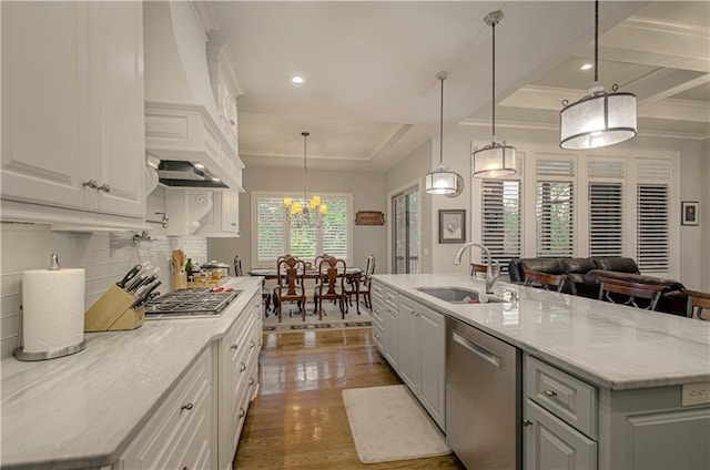 10423 W 168th Ter, Overland Park, KS 66221 - kitchen with appliances with stainless steel finishes, premium range hood, white cabinets, tasteful backsplash, and recessed lighting