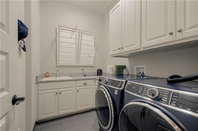 10423 W 168th Ter, Overland Park, KS 66221 - laundry area featuring cabinet space, washing machine and dryer, and tile patterned flooring
