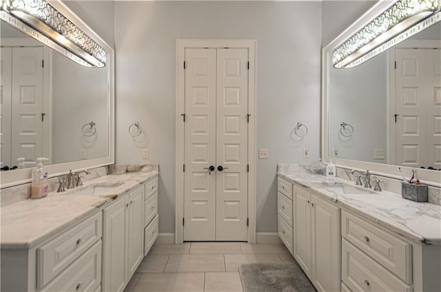 10423 W 168th Ter, Overland Park, KS 66221 - bathroom with two vanities and tile patterned flooring