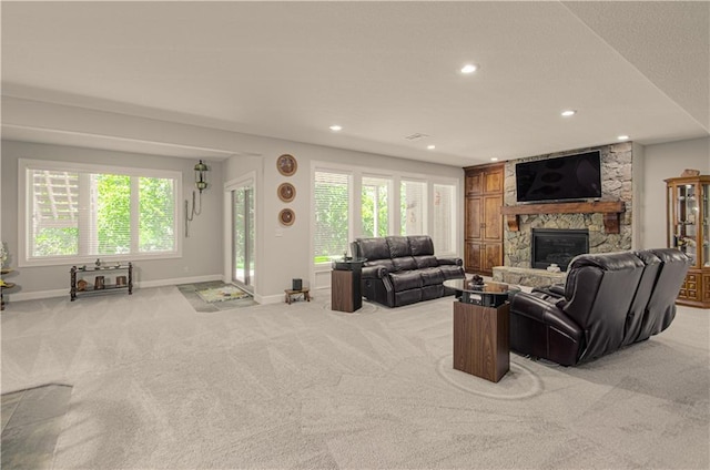 10423 W 168th Ter, Overland Park, KS 66221 - living area with light colored carpet, a fireplace, recessed lighting, and healthy amount of natural light