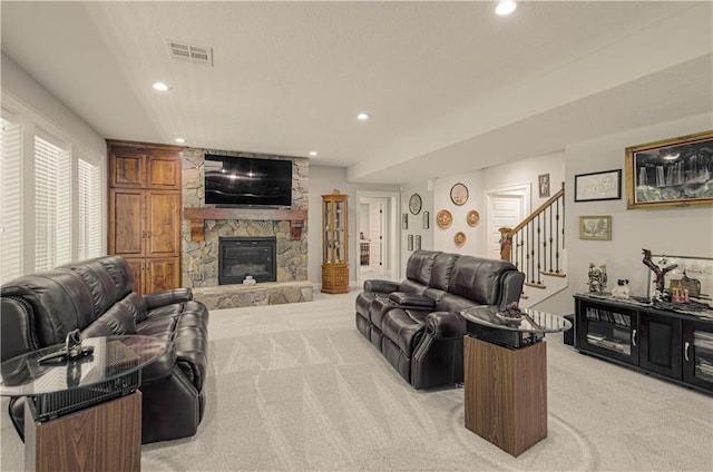 10423 W 168th Ter, Overland Park, KS 66221 - living area with light colored carpet, recessed lighting, stairway, and a fireplace