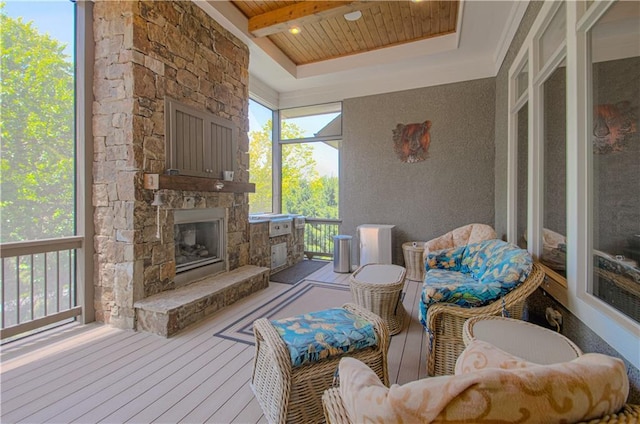 10423 W 168th Ter, Overland Park, KS 66221 - sunroom / solarium with a fireplace and healthy amount of natural light