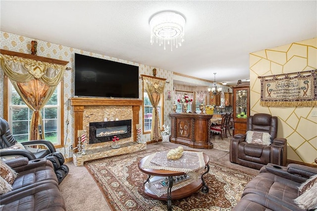 4407 SW Briarbrook Dr, Lees Summit, MO 64082 - carpeted living area featuring wallpapered walls, a chandelier, and a glass covered fireplace