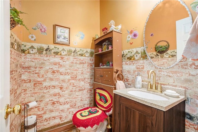 4407 SW Briarbrook Dr, Lees Summit, MO 64082 - bathroom featuring vanity and a wainscoted wall