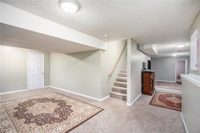 4407 SW Briarbrook Dr, Lees Summit, MO 64082 - finished basement featuring carpet, a textured ceiling, and stairs
