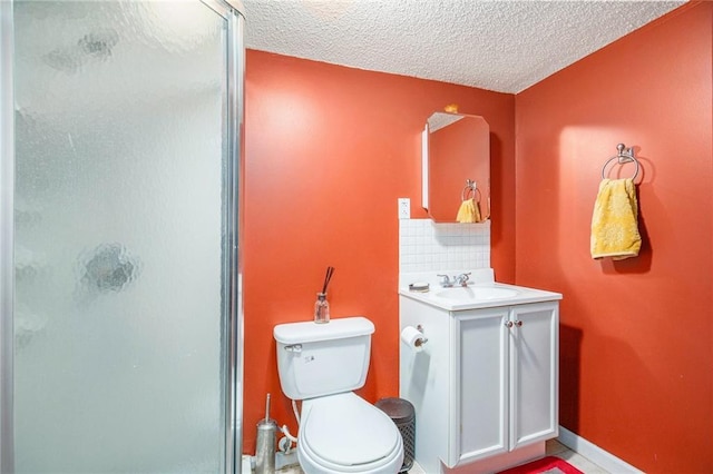 4407 SW Briarbrook Dr, Lees Summit, MO 64082 - bathroom with a shower stall, vanity, a textured ceiling, and decorative backsplash