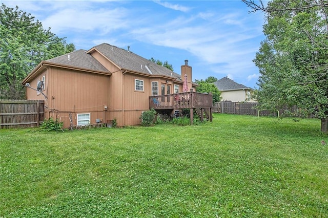 4407 SW Briarbrook Dr, Lees Summit, MO 64082 - back of property with a wooden deck, a fenced backyard, and roof with shingles