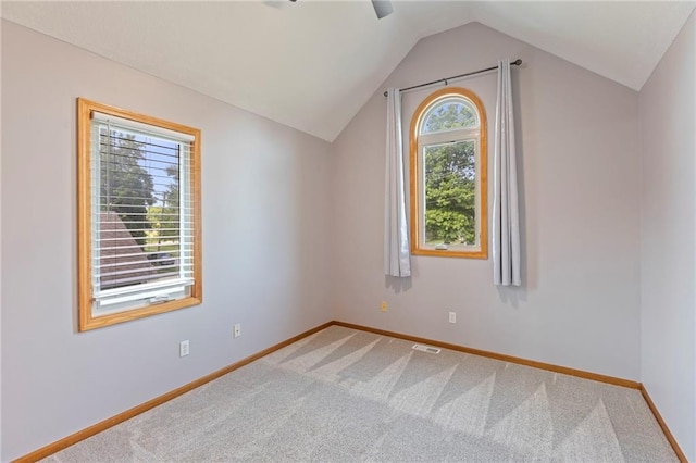 1125 S Mulberry St, Ottawa, KS 66067 - bonus room with vaulted ceiling, carpet, and ceiling fan
