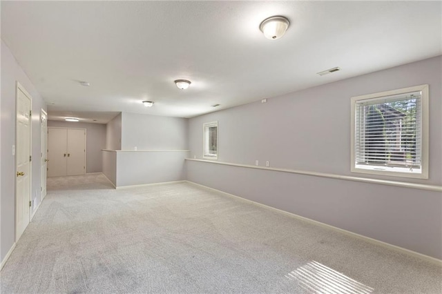 1125 S Mulberry St, Ottawa, KS 66067 - basement featuring carpet and baseboards