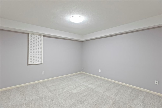 1125 S Mulberry St, Ottawa, KS 66067 - empty room featuring carpet floors and a textured ceiling