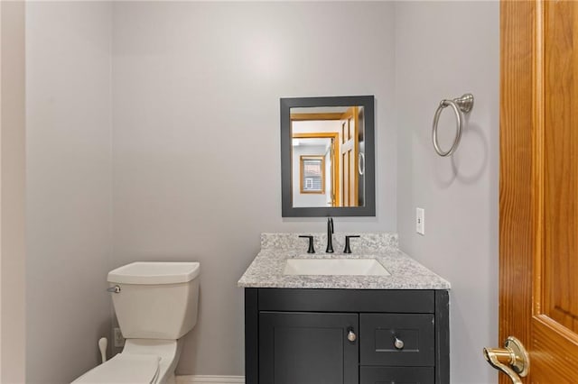 1125 S Mulberry St, Ottawa, KS 66067 - half bathroom with toilet and vanity