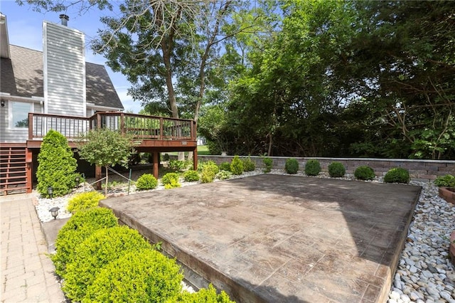 1125 S Mulberry St, Ottawa, KS 66067 - view of patio / terrace with a deck and stairs