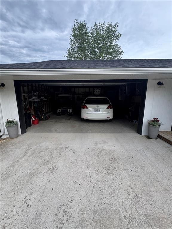 109 W 3rd St, Stanberry, MO 64489 - garage featuring driveway