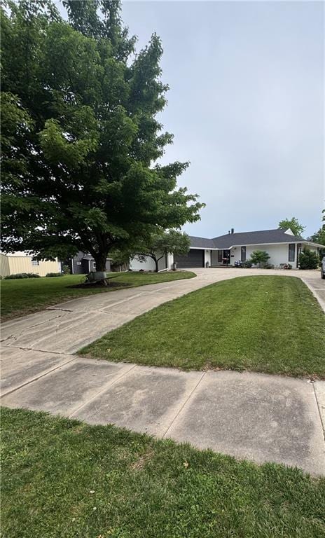 109 W 3rd St, Stanberry, MO 64489 - view of front of property with concrete driveway