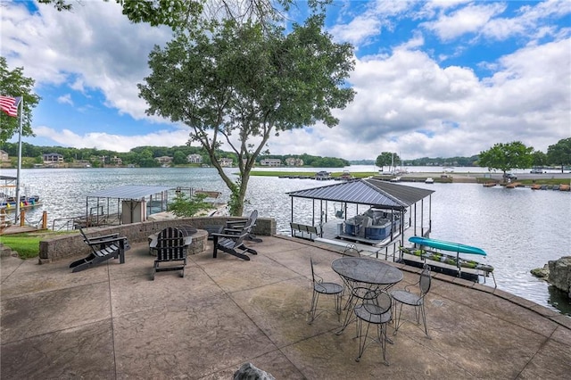 6 Mohave Dr, Lake Winnebago, MO 64034 - view of patio / terrace featuring a water view, an outdoor fire pit, and a boat dock