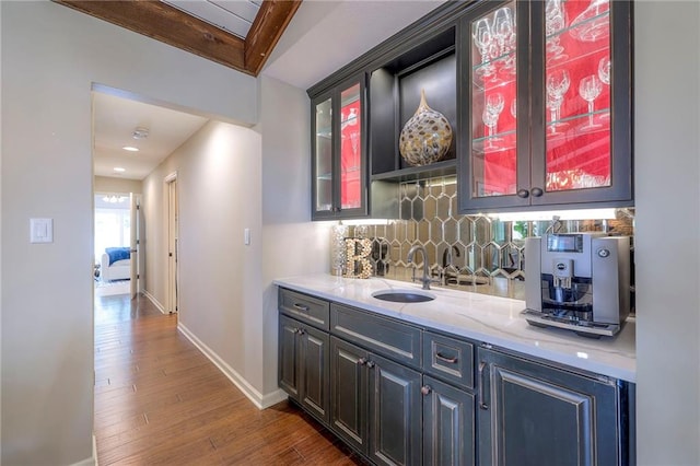 6 Mohave Dr, Lake Winnebago, MO 64034 - bar featuring wood finished floors and backsplash