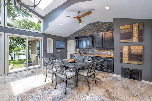 6 Mohave Dr, Lake Winnebago, MO 64034 - dining space with stone tile flooring, ceiling fan, recessed lighting, and high vaulted ceiling