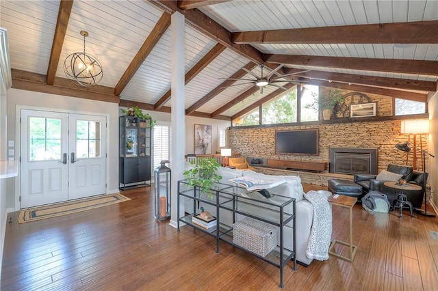6 Mohave Dr, Lake Winnebago, MO 64034 - living area featuring hardwood / wood-style flooring, french doors, a stone fireplace, wood ceiling, and a ceiling fan
