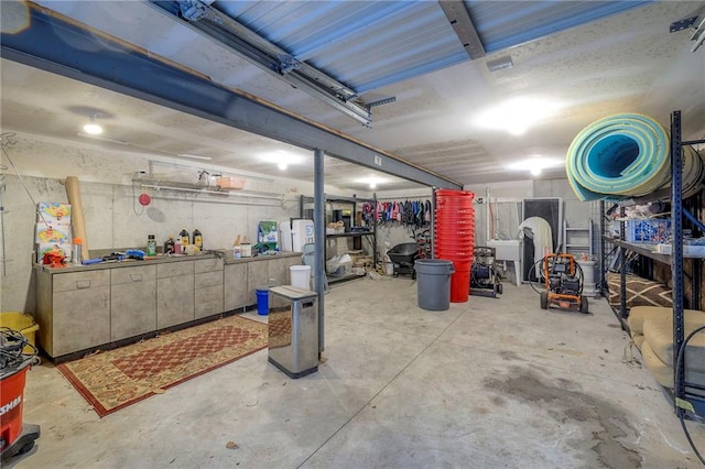 6 Mohave Dr, Lake Winnebago, MO 64034 - garage with a workshop area