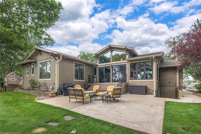 6 Mohave Dr, Lake Winnebago, MO 64034 - back of property with a patio, a sunroom, an outdoor living space, and stucco siding