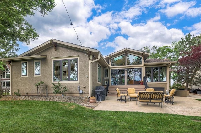 6 Mohave Dr, Lake Winnebago, MO 64034 - rear view of house with a patio area, outdoor lounge area, a lawn, a sunroom, and stucco siding
