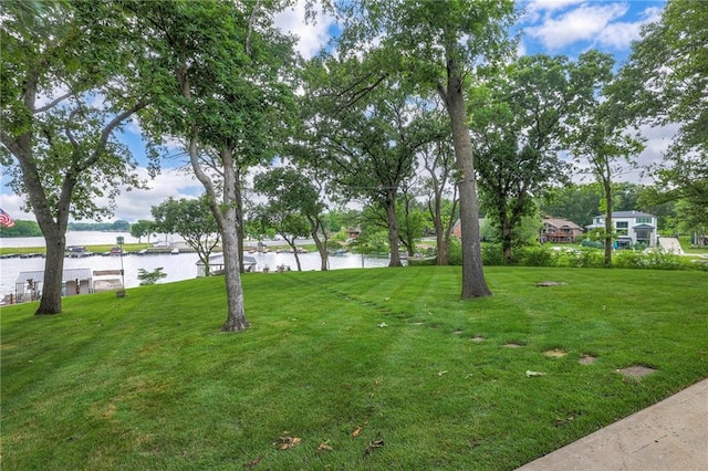 6 Mohave Dr, Lake Winnebago, MO 64034 - view of green lawn featuring a water view