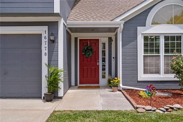 16778 W 156th Ter, Olathe, KS 66062 - doorway to property with a shingled roof