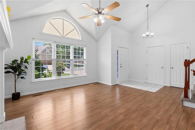 16778 W 156th Ter, Olathe, KS 66062 - entrance foyer with a ceiling fan, high vaulted ceiling, light wood-style flooring, and a chandelier