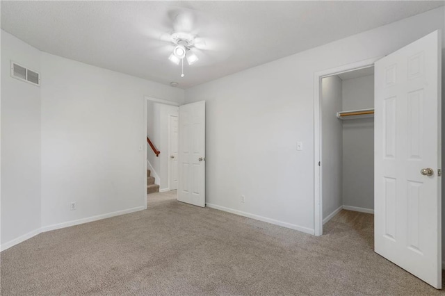 16778 W 156th Ter, Olathe, KS 66062 - unfurnished bedroom with carpet, a walk in closet, and a closet