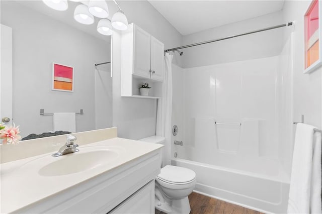 16778 W 156th Ter, Olathe, KS 66062 - bathroom with vanity, bathtub / shower combination, and wood finished floors