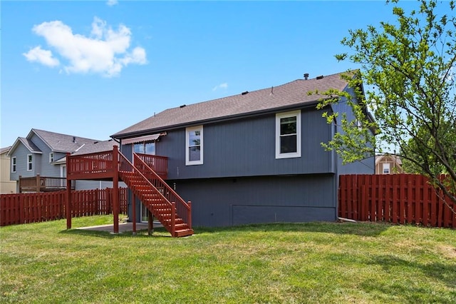 16778 W 156th Ter, Olathe, KS 66062 - rear view of house with a fenced backyard, a deck, stairs, and roof with shingles