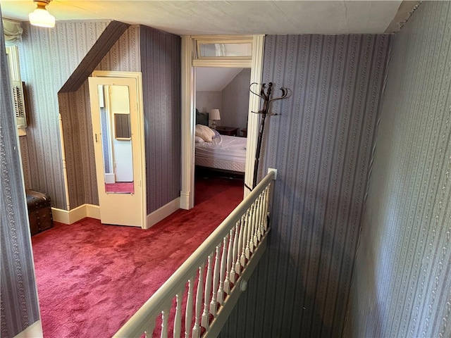222 W Gay St, Warrensburg, MO 64093 - hall with carpet, wallpapered walls, and an upstairs landing